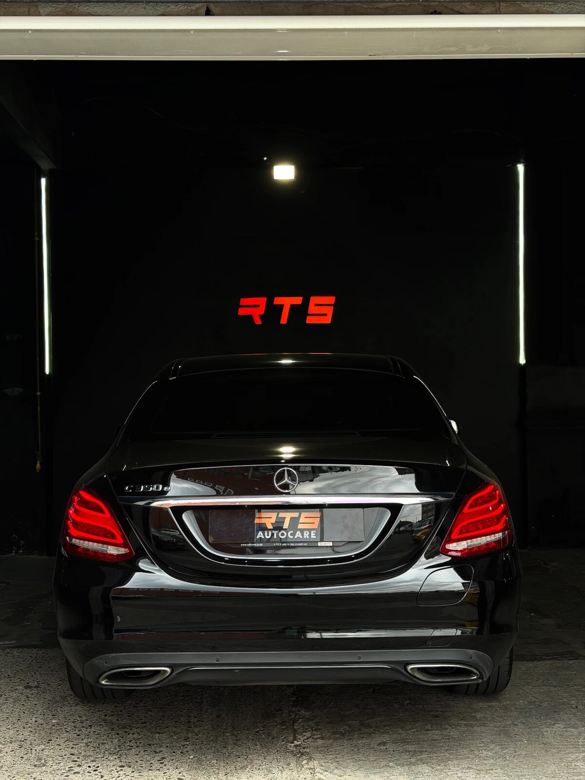 Mercedes-Benz C 350 e finished and lit under the red RTS sign