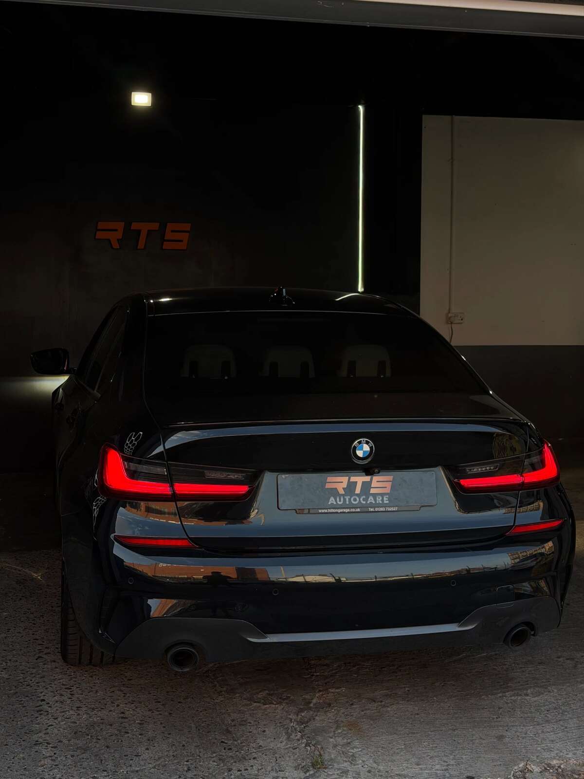 BMW 3 Series with RTS Autocare plate inside the unit